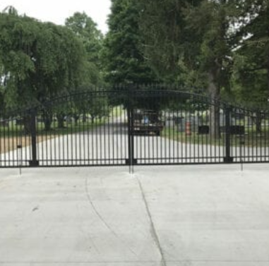 Arched ornamental double driveway gate