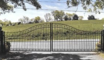 Custom arched ornamental iron gate