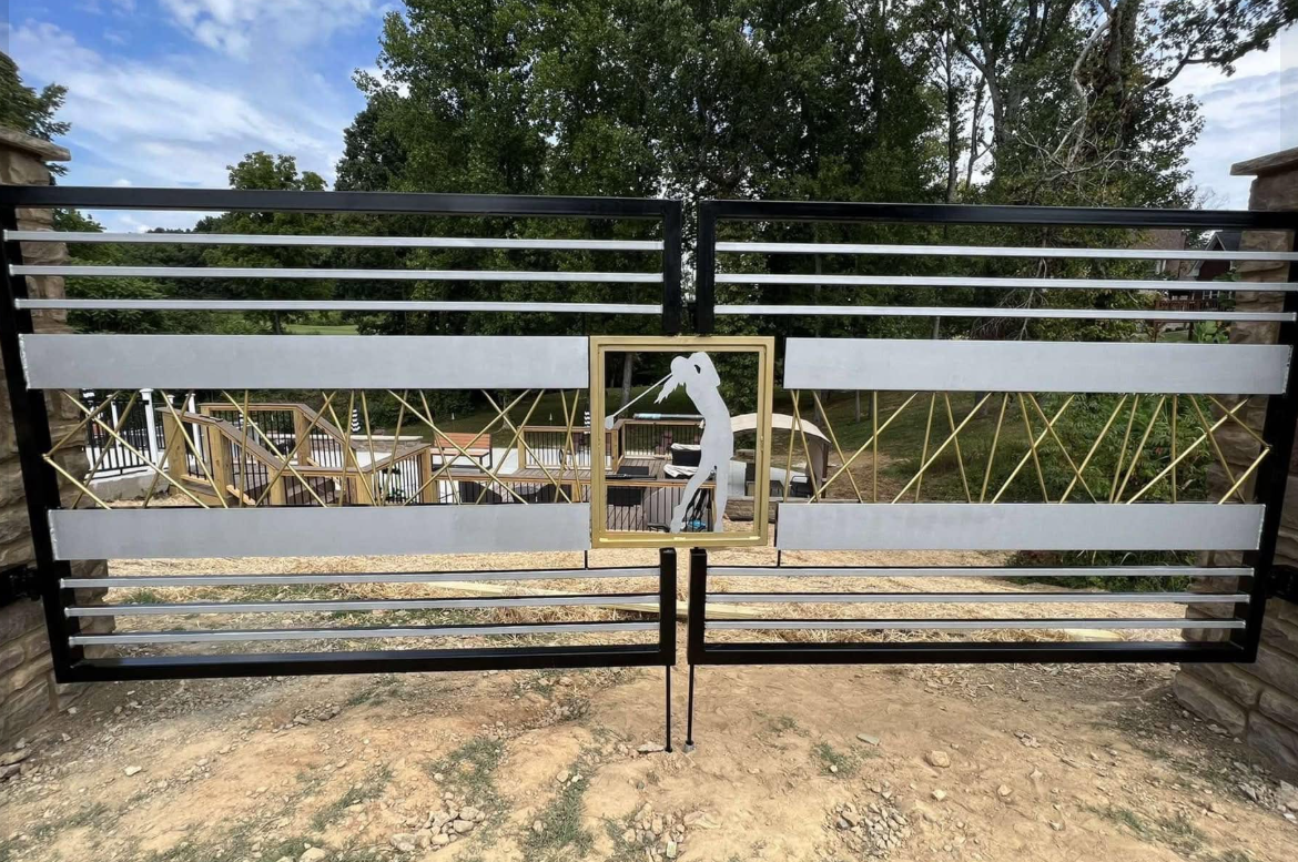 Modern horizontal slat estate gate with golfer silhouette