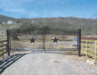 Iron ranch gate with star accents