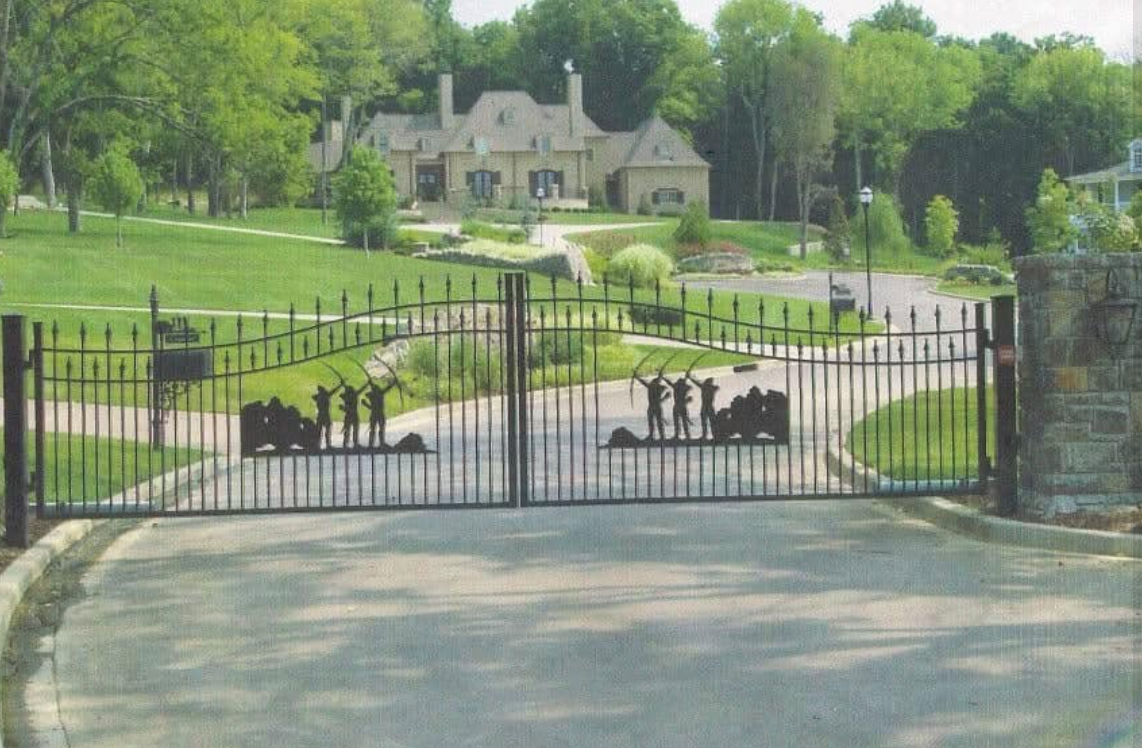 Custom estate gate with archer silhouette artwork